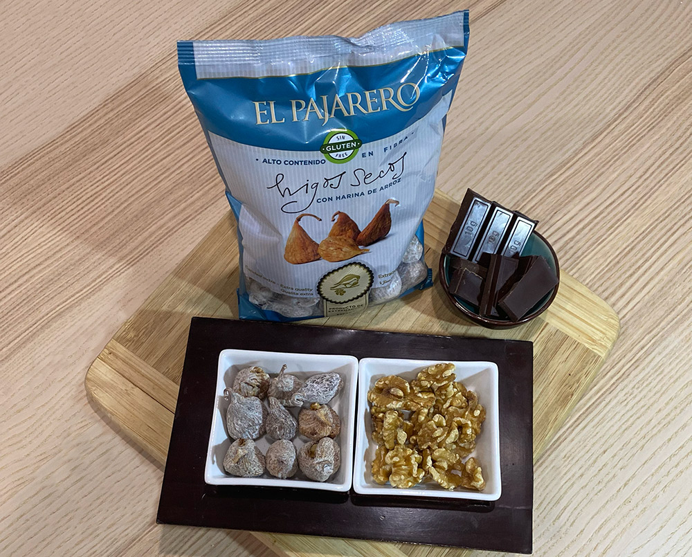 Delicious dried fig chocolates with chocolate and walnut hearts