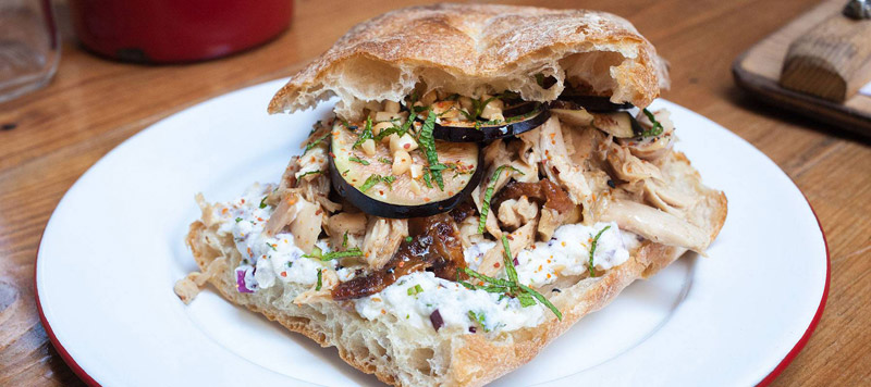 Dried figs with eggplant, onion and roasted chicken sandwich